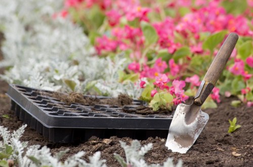 Professional landscape gardening in Cann Hall with turf, borders, and hard landscaping
